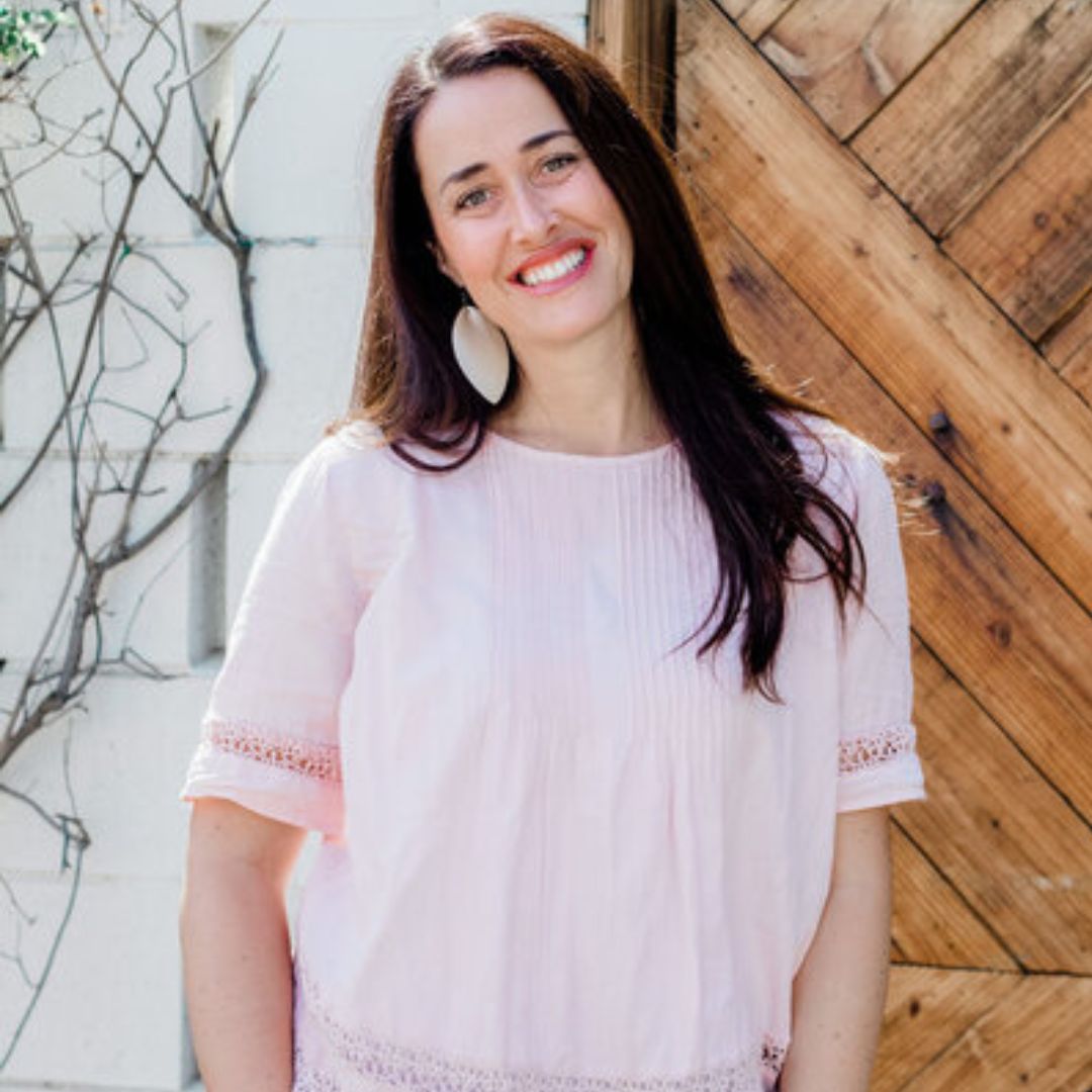 Kelly in pink shirt. Happy about the relationship advice she can now give her teens